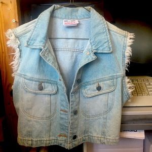 Distressed denim vest